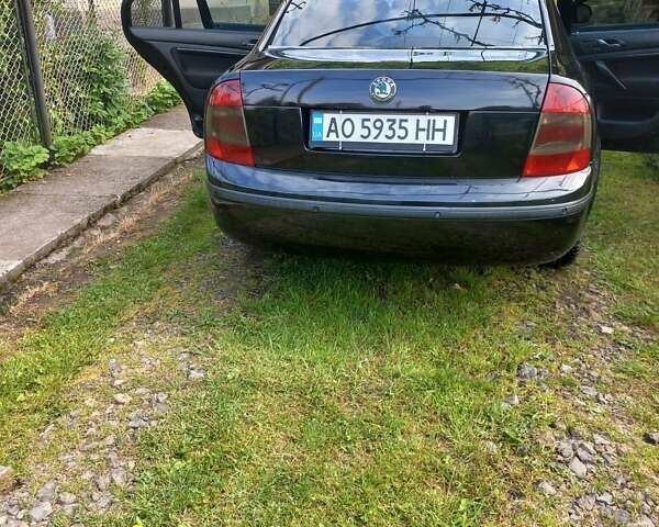 Черный Шкода Суперб, объемом двигателя 1.9 л и пробегом 318 тыс. км за 5700 $, фото 15 на Automoto.ua