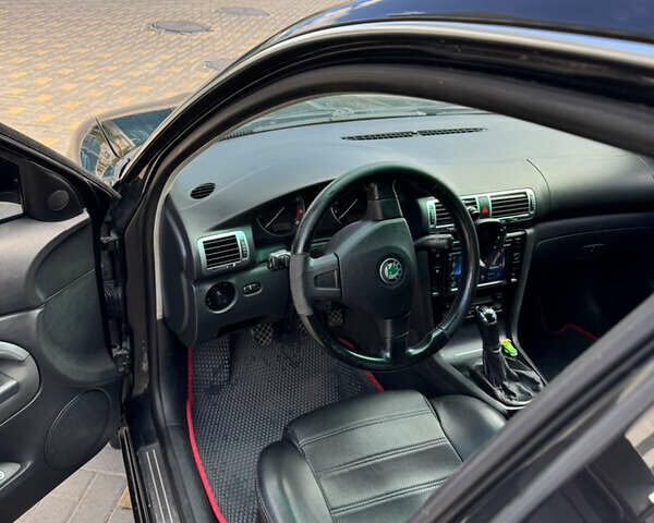 Черный Шкода Суперб, объемом двигателя 2 л и пробегом 210 тыс. км за 6299 $, фото 17 на Automoto.ua