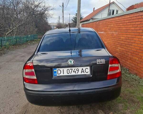 Черный Шкода Суперб, объемом двигателя 1.78 л и пробегом 170 тыс. км за 6000 $, фото 1 на Automoto.ua