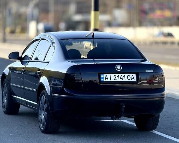 Черный Шкода Суперб, объемом двигателя 1.9 л и пробегом 335 тыс. км за 6000 $, фото 2 на Automoto.ua