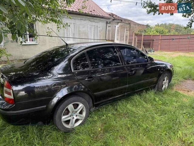 Черный Шкода Суперб, объемом двигателя 1.78 л и пробегом 312 тыс. км за 5300 $, фото 2 на Automoto.ua
