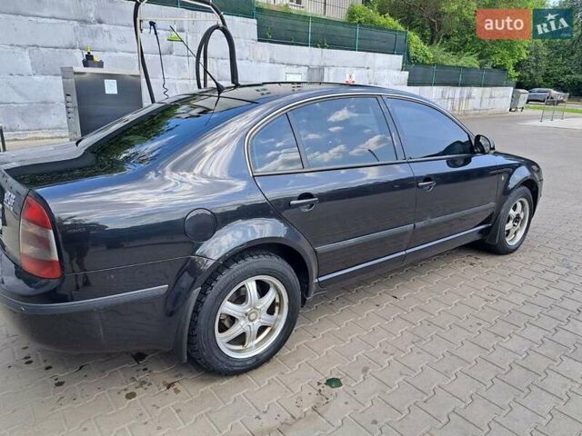 Черный Шкода Суперб, объемом двигателя 1.9 л и пробегом 362 тыс. км за 5500 $, фото 17 на Automoto.ua