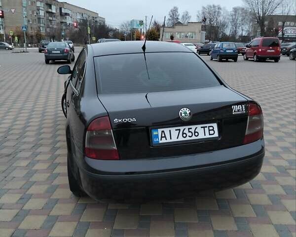 Черный Шкода Суперб, объемом двигателя 1.9 л и пробегом 240 тыс. км за 5600 $, фото 3 на Automoto.ua