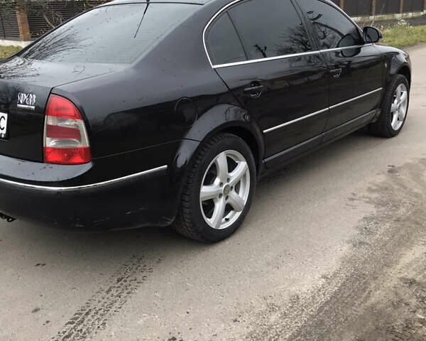 Чорний Шкода Суперб, об'ємом двигуна 2 л та пробігом 333 тис. км за 5500 $, фото 4 на Automoto.ua