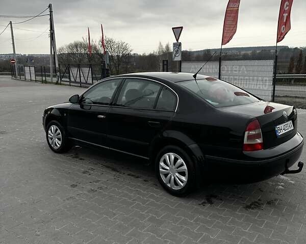 Черный Шкода Суперб, объемом двигателя 1.78 л и пробегом 352 тыс. км за 4700 $, фото 12 на Automoto.ua