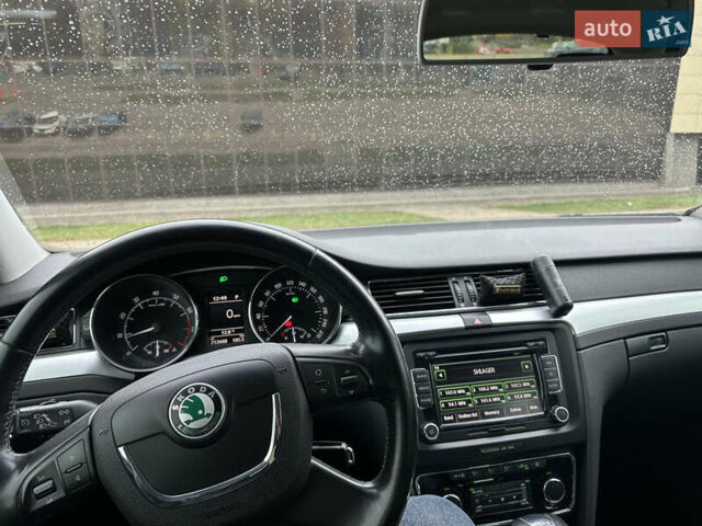 Шкода Суперб 2010 у Запоріжжя на Automoto.ua Чорний Шкода Суперб, об'ємом двигуна 1.8 л та пробігом 212 тис. км за 10500 $, фото 13 на Automoto.ua