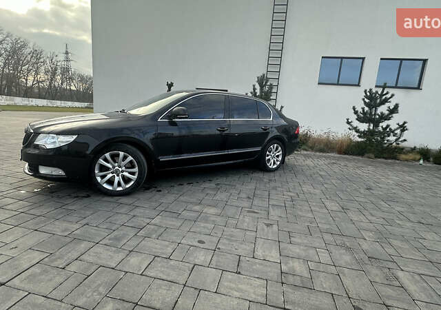 Черный Шкода Суперб, объемом двигателя 2 л и пробегом 296 тыс. км за 9300 $, фото 3 на Automoto.ua