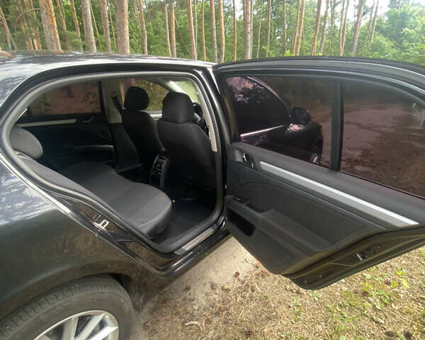 Черный Шкода Суперб, объемом двигателя 1.8 л и пробегом 165 тыс. км за 12000 $, фото 4 на Automoto.ua