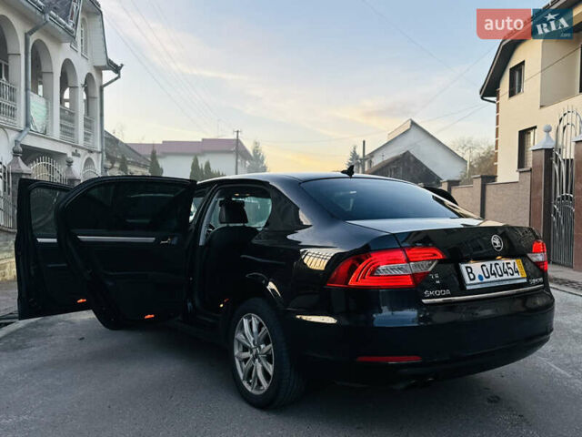 Черный Шкода Суперб, объемом двигателя 2 л и пробегом 326 тыс. км за 12700 $, фото 1 на Automoto.ua