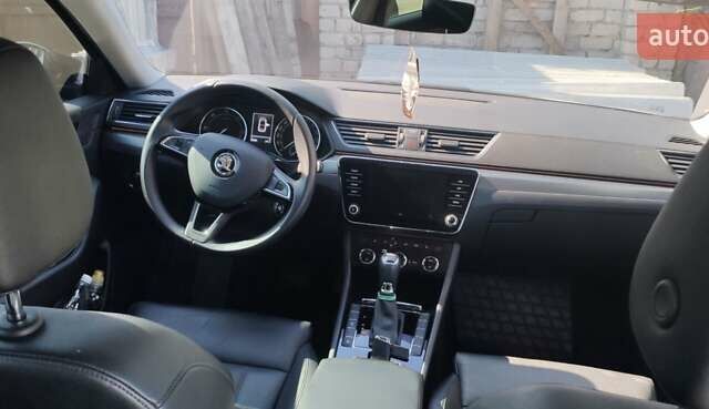 Черный Шкода Суперб, объемом двигателя 2 л и пробегом 54 тыс. км за 30000 $, фото 3 на Automoto.ua