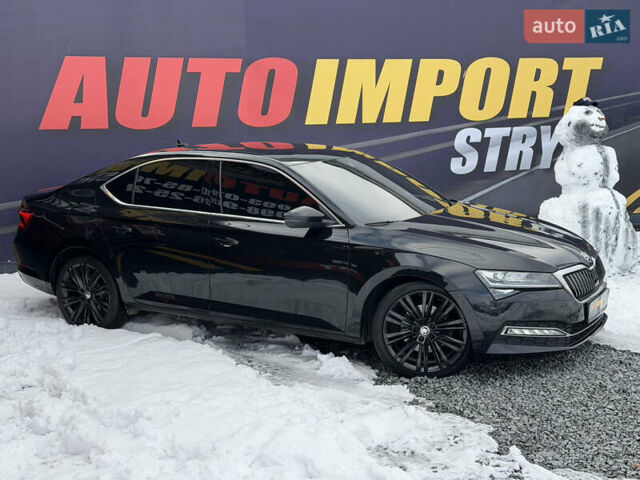Черный Шкода Суперб, объемом двигателя 1.97 л и пробегом 149 тыс. км за 31500 $, фото 1 на Automoto.ua