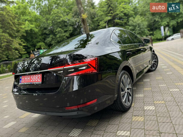 Чорний Шкода Суперб, об'ємом двигуна 2 л та пробігом 209 тис. км за 27999 $, фото 165 на Automoto.ua