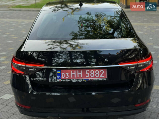 Чорний Шкода Суперб, об'ємом двигуна 2 л та пробігом 209 тис. км за 27999 $, фото 126 на Automoto.ua