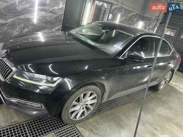 Черный Шкода Суперб, объемом двигателя 2 л и пробегом 92 тыс. км за 29800 $, фото 1 на Automoto.ua