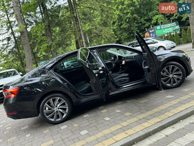 Чорний Шкода Суперб, об'ємом двигуна 2 л та пробігом 209 тис. км за 27999 $, фото 45 на Automoto.ua