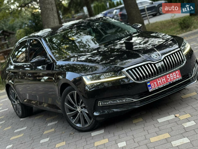 Чорний Шкода Суперб, об'ємом двигуна 2 л та пробігом 209 тис. км за 27999 $, фото 128 на Automoto.ua