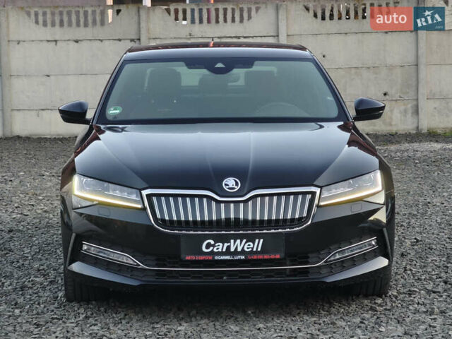 Черный Шкода Суперб, объемом двигателя 1.4 л и пробегом 134 тыс. км за 31999 $, фото 1 на Automoto.ua