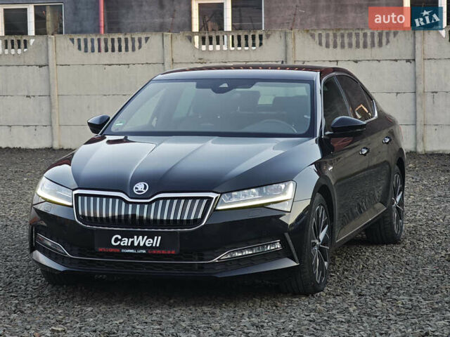 Черный Шкода Суперб, объемом двигателя 1.4 л и пробегом 134 тыс. км за 31999 $, фото 2 на Automoto.ua