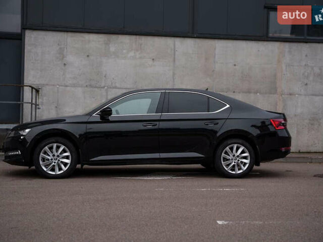 Черный Шкода Суперб, объемом двигателя 1.98 л и пробегом 27 тыс. км за 30000 $, фото 3 на Automoto.ua