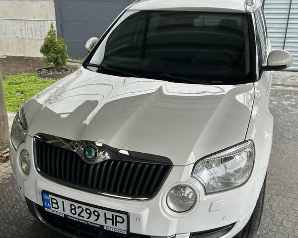 Білий Шкода Єті, об'ємом двигуна 1.2 л та пробігом 194 тис. км за 8600 $, фото 12 на Automoto.ua