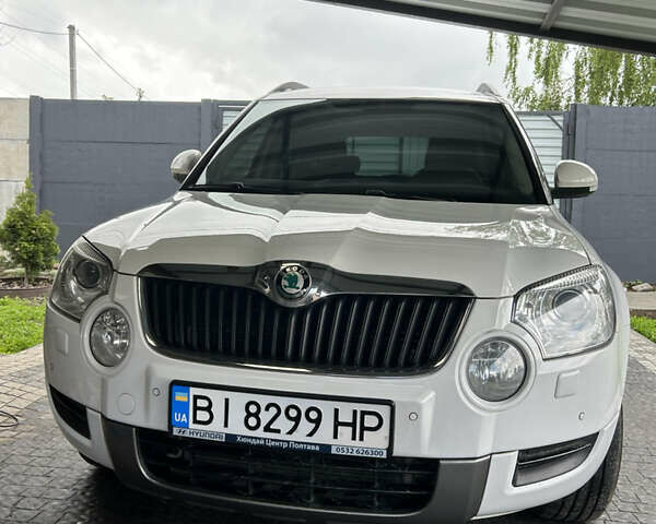 Білий Шкода Єті, об'ємом двигуна 1.2 л та пробігом 194 тис. км за 8600 $, фото 10 на Automoto.ua