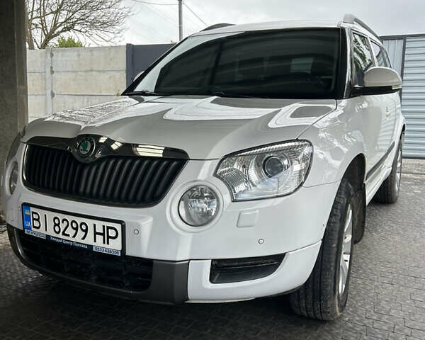 Білий Шкода Єті, об'ємом двигуна 1.2 л та пробігом 194 тис. км за 8600 $, фото 13 на Automoto.ua