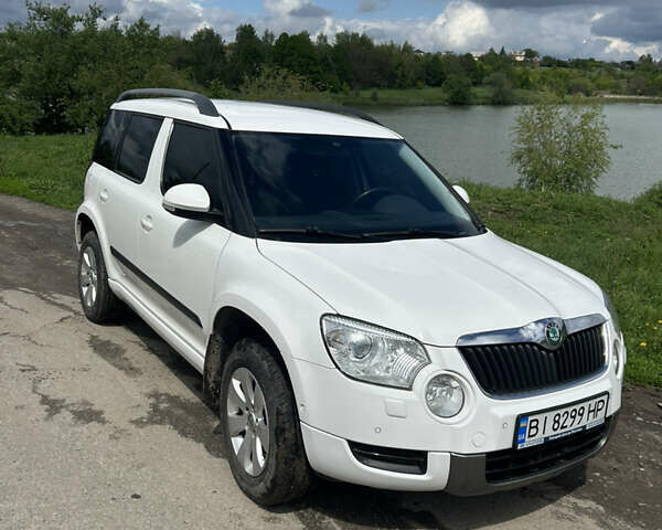 Білий Шкода Єті, об'ємом двигуна 1.2 л та пробігом 194 тис. км за 8600 $, фото 6 на Automoto.ua