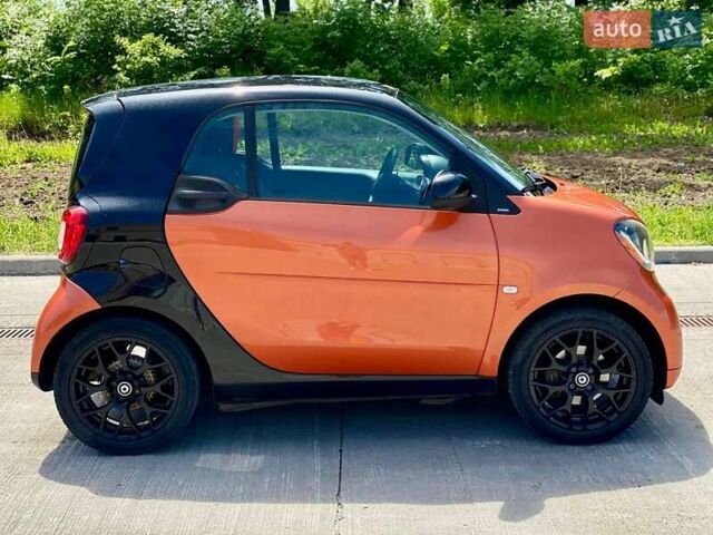 Помаранчевий Смарт Fortwo, об'ємом двигуна 1 л та пробігом 61 тис. км за 9990 $, фото 11 на Automoto.ua