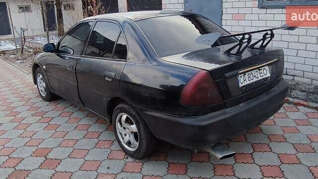 Черный СауИст Лионсел, объемом двигателя 1.6 л и пробегом 256 тыс. км за 1800 $, фото 3 на Automoto.ua