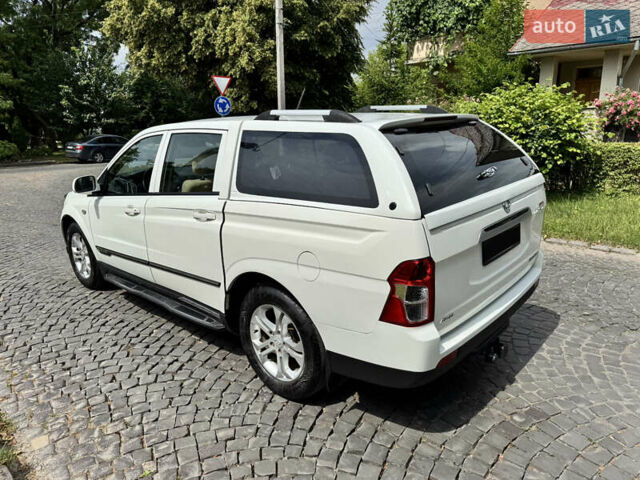 Білий Cанг Йонг Actyon, об'ємом двигуна 2 л та пробігом 180 тис. км за 14200 $, фото 6 на Automoto.ua