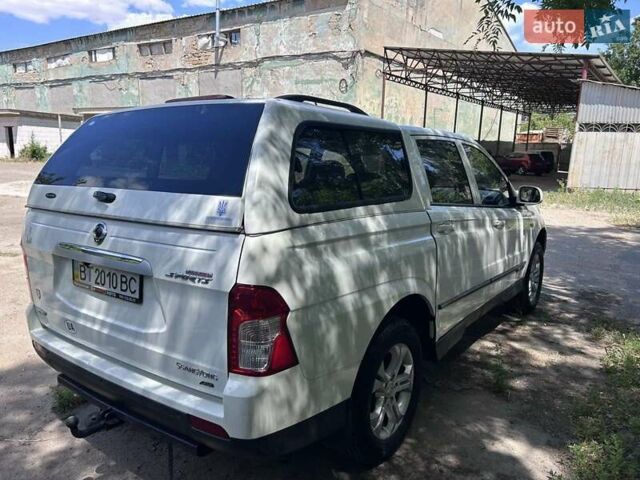 Білий Cанг Йонг Actyon, об'ємом двигуна 2 л та пробігом 180 тис. км за 14000 $, фото 7 на Automoto.ua