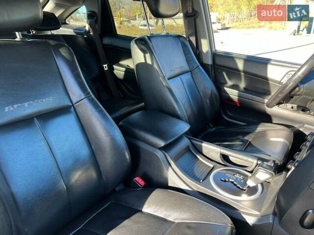 Белый Cанг Йонг Актион, объемом двигателя 2 л и пробегом 230 тыс. км за 6500 $, фото 13 на Automoto.ua