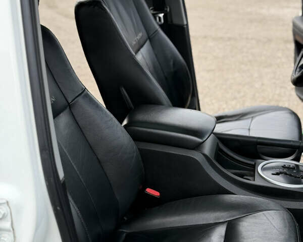 Белый Cанг Йонг Актион, объемом двигателя 2 л и пробегом 202 тыс. км за 6600 $, фото 10 на Automoto.ua