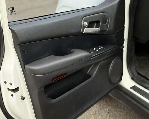 Белый Cанг Йонг Актион, объемом двигателя 2 л и пробегом 202 тыс. км за 6600 $, фото 13 на Automoto.ua