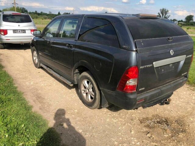 Черный Cанг Йонг Актион, объемом двигателя 2 л и пробегом 155 тыс. км за 1999 $, фото 3 на Automoto.ua