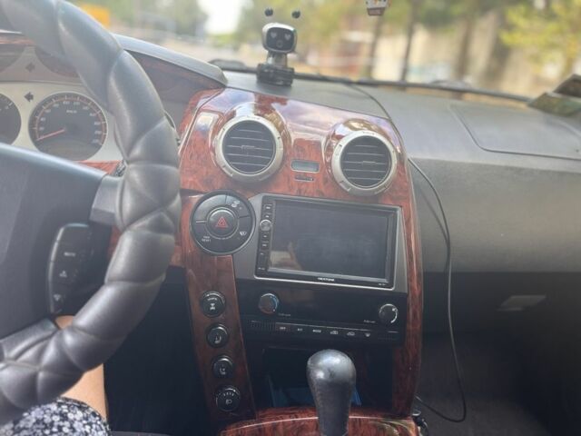 Черный Cанг Йонг Актион, объемом двигателя 2 л и пробегом 266 тыс. км за 7500 $, фото 9 на Automoto.ua