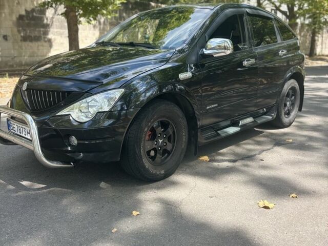 Черный Cанг Йонг Актион, объемом двигателя 2 л и пробегом 266 тыс. км за 7500 $, фото 1 на Automoto.ua