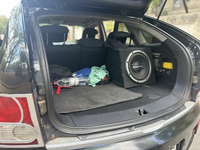 Черный Cанг Йонг Актион, объемом двигателя 2 л и пробегом 266 тыс. км за 7500 $, фото 10 на Automoto.ua