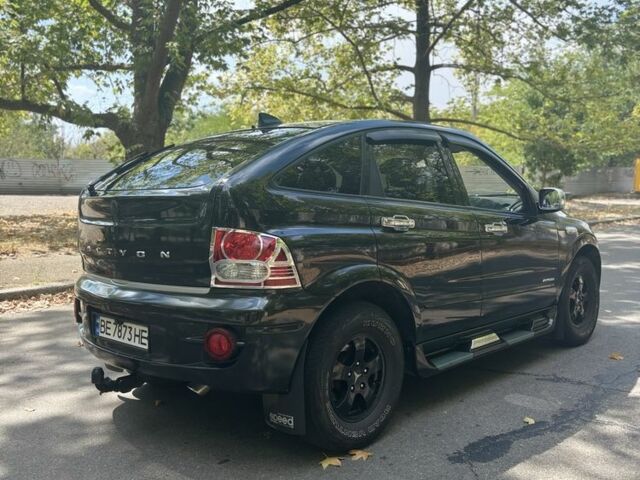 Черный Cанг Йонг Актион, объемом двигателя 2 л и пробегом 266 тыс. км за 7500 $, фото 2 на Automoto.ua