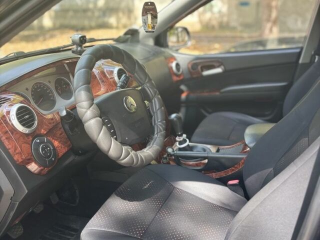 Черный Cанг Йонг Актион, объемом двигателя 2 л и пробегом 266 тыс. км за 7500 $, фото 6 на Automoto.ua