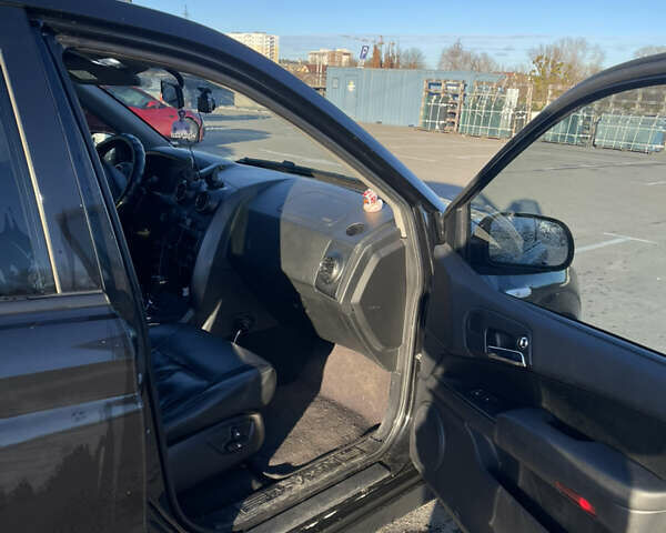 Черный Cанг Йонг Актион, объемом двигателя 2.3 л и пробегом 223 тыс. км за 5500 $, фото 9 на Automoto.ua