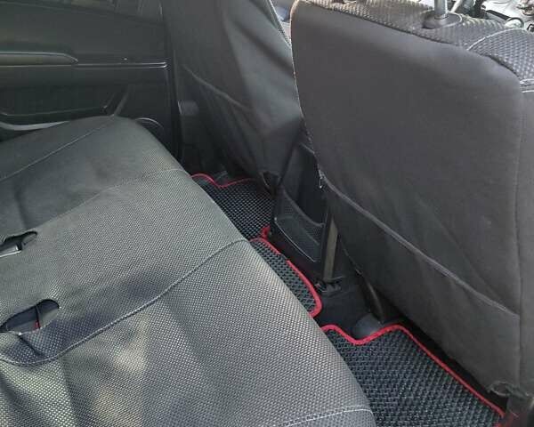 Чорний Cанг Йонг Actyon, об'ємом двигуна 2 л та пробігом 221 тис. км за 5800 $, фото 23 на Automoto.ua