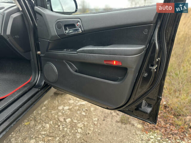 Чорний Cанг Йонг Actyon, об'ємом двигуна 2 л та пробігом 110 тис. км за 6900 $, фото 38 на Automoto.ua