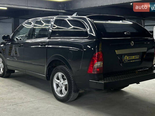 Черный Cанг Йонг Актион, объемом двигателя 0 л и пробегом 142 тыс. км за 9000 $, фото 3 на Automoto.ua