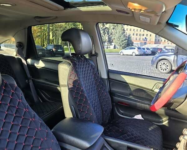 Черный Cанг Йонг Актион, объемом двигателя 2.3 л и пробегом 163 тыс. км за 6990 $, фото 3 на Automoto.ua