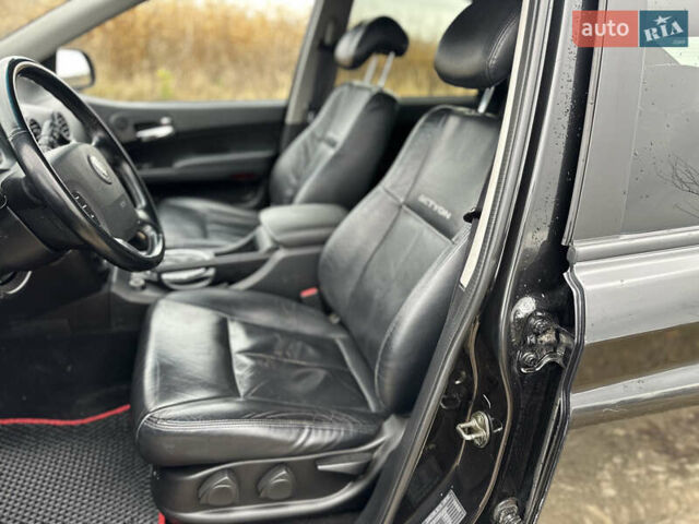 Чорний Cанг Йонг Actyon, об'ємом двигуна 2 л та пробігом 110 тис. км за 6900 $, фото 28 на Automoto.ua