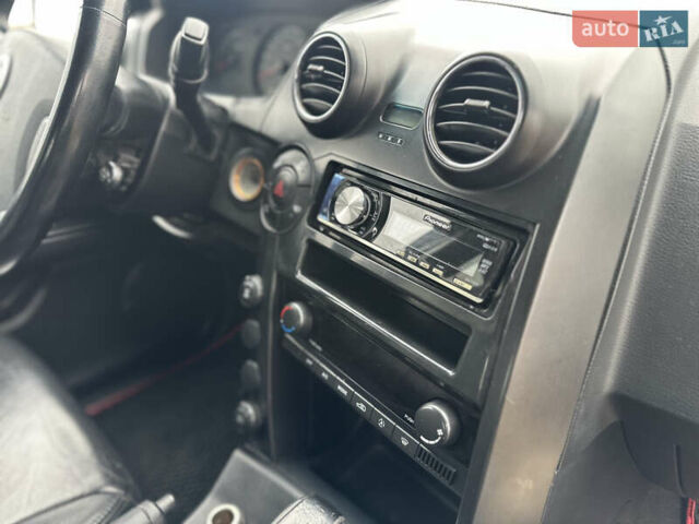 Чорний Cанг Йонг Actyon, об'ємом двигуна 2 л та пробігом 110 тис. км за 6900 $, фото 41 на Automoto.ua