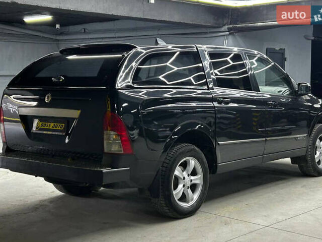 Черный Cанг Йонг Актион, объемом двигателя 0 л и пробегом 142 тыс. км за 9000 $, фото 4 на Automoto.ua