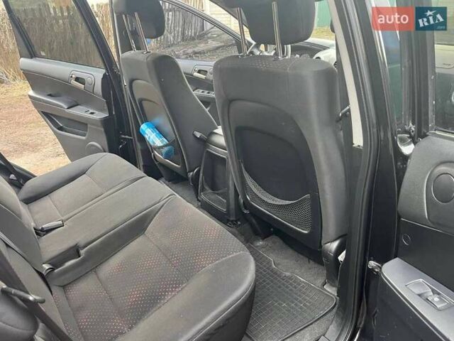Чорний Cанг Йонг Actyon, об'ємом двигуна 2 л та пробігом 240 тис. км за 8500 $, фото 7 на Automoto.ua