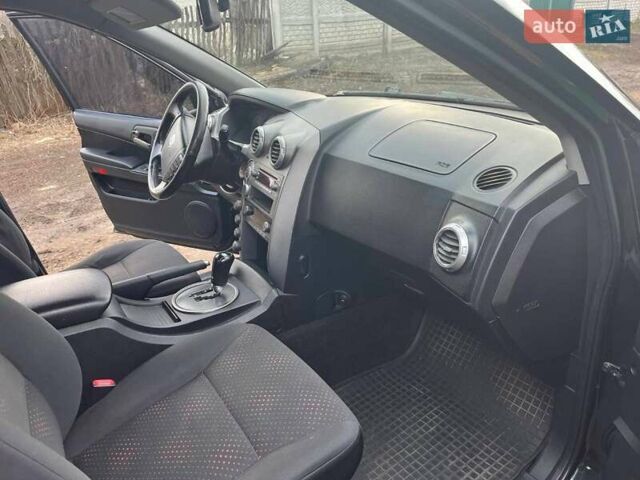 Чорний Cанг Йонг Actyon, об'ємом двигуна 2 л та пробігом 240 тис. км за 8500 $, фото 5 на Automoto.ua